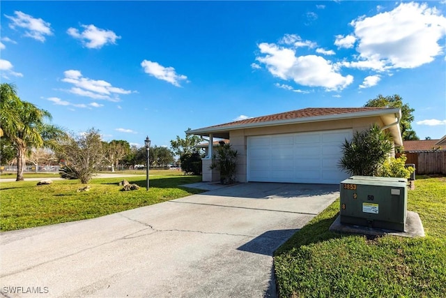 exterior space with a lawn and driveway