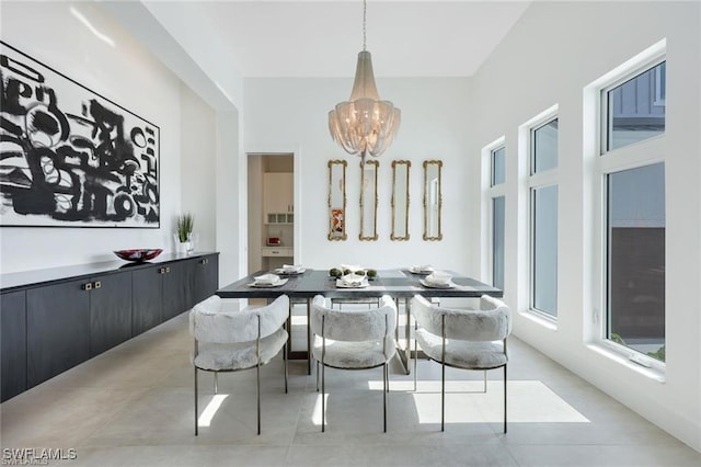 dining space with a notable chandelier