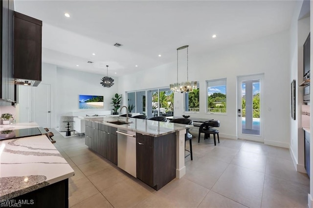 kitchen with dark brown cabinetry, a large island, pendant lighting, and dishwasher