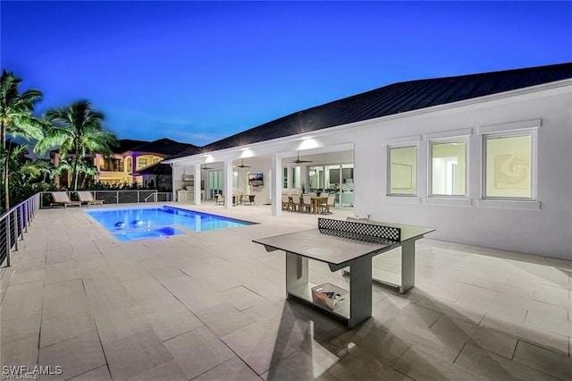 view of pool featuring a fenced in pool, ceiling fan, fence, outdoor dining area, and a patio area