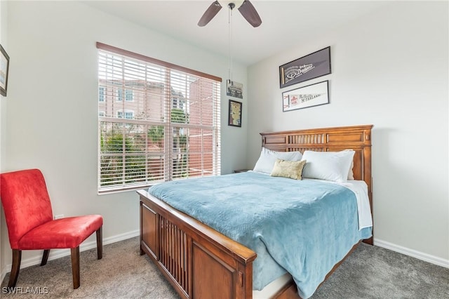 bedroom featuring light carpet, ceiling fan, and baseboards