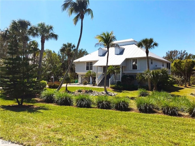 view of front of home with a front yard