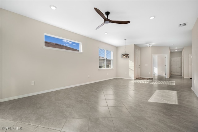 unfurnished living room featuring visible vents, baseboards, a ceiling fan, light tile patterned flooring, and recessed lighting