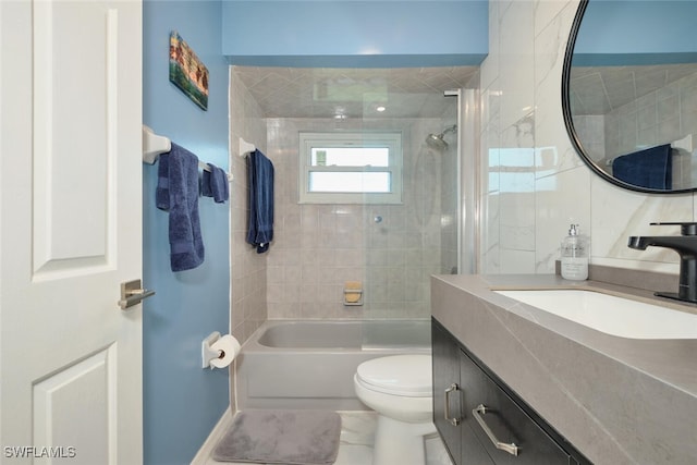 full bathroom featuring vanity, toilet, and shower / bathtub combination