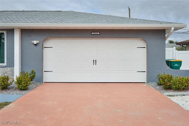 garage with driveway