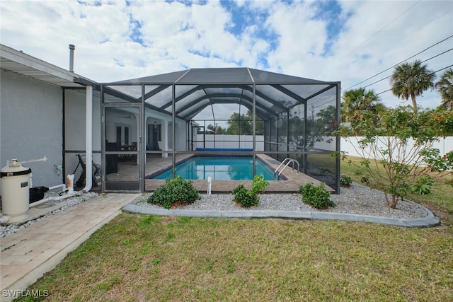 view of pool with a fenced in pool, a yard, a patio area, a lanai, and a fenced backyard