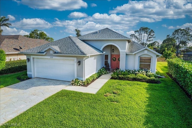 ranch-style house with driveway, a garage, a shingled roof, a front lawn, and stucco siding