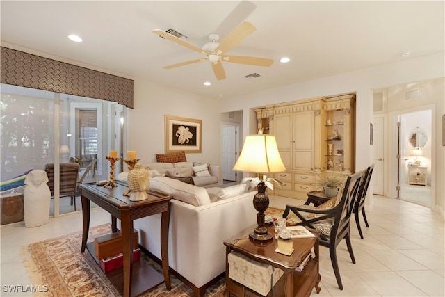 living room with a ceiling fan, light tile patterned flooring, visible vents, and recessed lighting