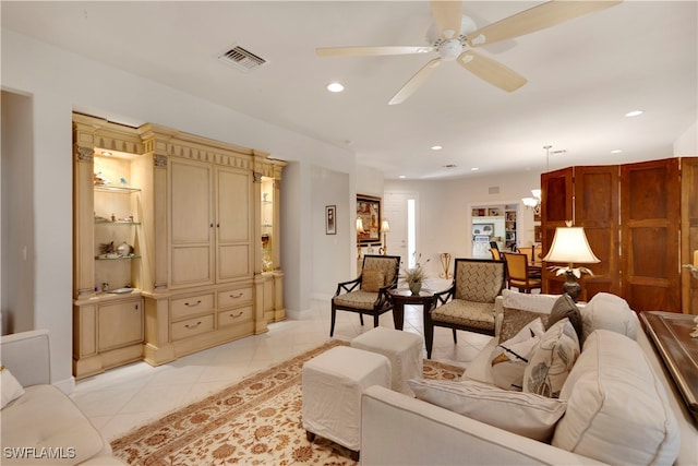 living area featuring recessed lighting, visible vents, a ceiling fan, and light tile patterned flooring