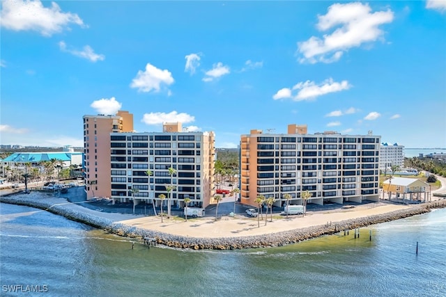 aerial view featuring a beach view and a water view