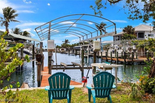 dock area featuring a water view and boat lift