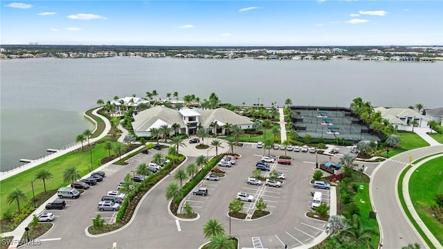 bird's eye view featuring a water view and a residential view