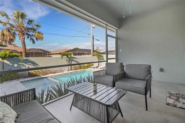 exterior space featuring fence, an outdoor living space, and a fenced in pool