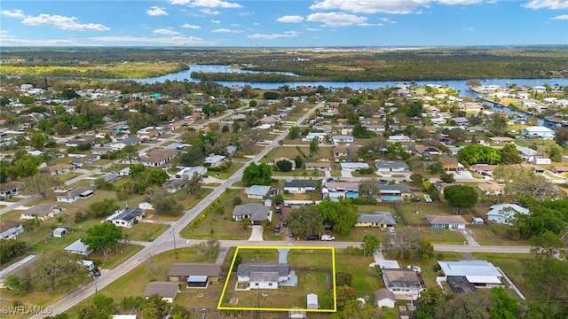 13007 Caribbean Blvd, Fort Myers, FL 33905 - drone / aerial view with a residential view and a water view