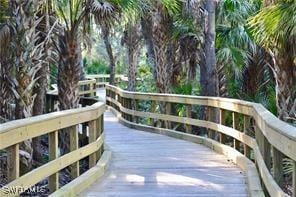 surrounding community with a wooden deck