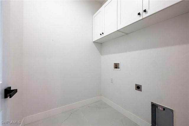 laundry room featuring hookup for a washing machine, hookup for an electric dryer, baseboards, marble finish floor, and cabinet space