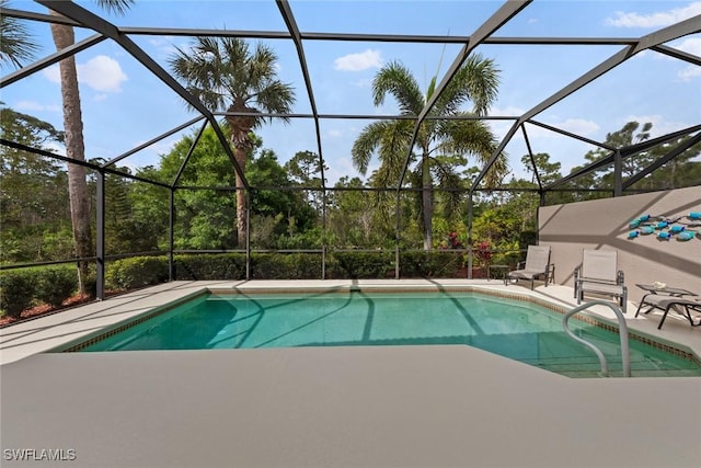 pool featuring a lanai and a patio