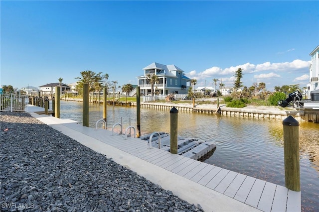 view of dock with a water view