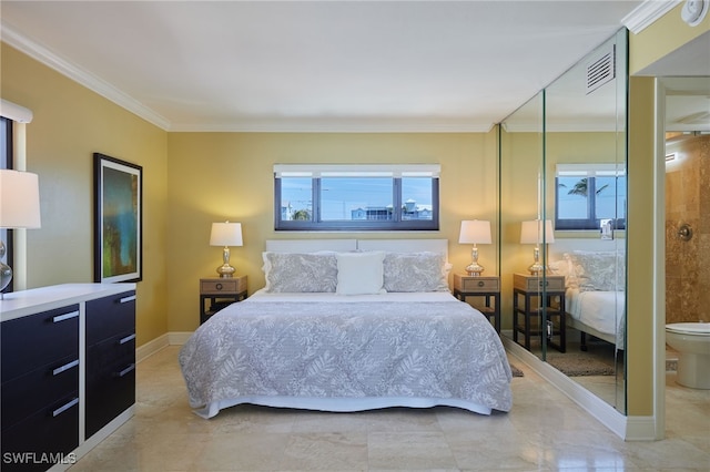 bedroom featuring a closet, visible vents, crown molding, and baseboards