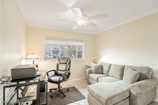 office area featuring light tile patterned floors, baseboards, ornamental molding, and a ceiling fan