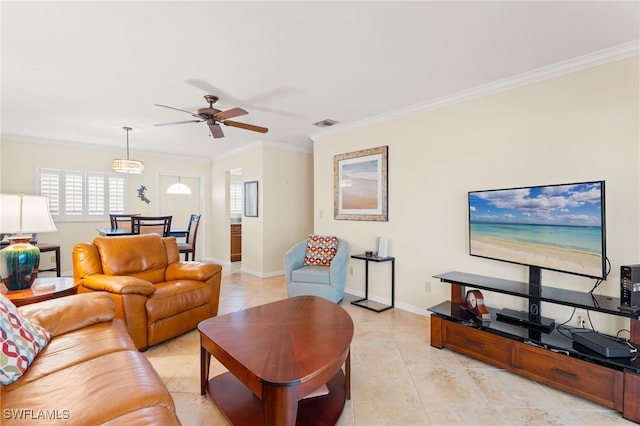 living area featuring light tile patterned floors, baseboards, visible vents, and ornamental molding