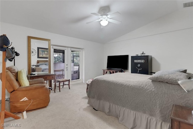 bedroom with visible vents, lofted ceiling, access to outside, carpet flooring, and french doors