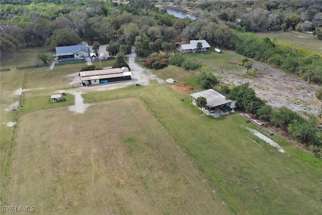 aerial view with a rural view and a water view