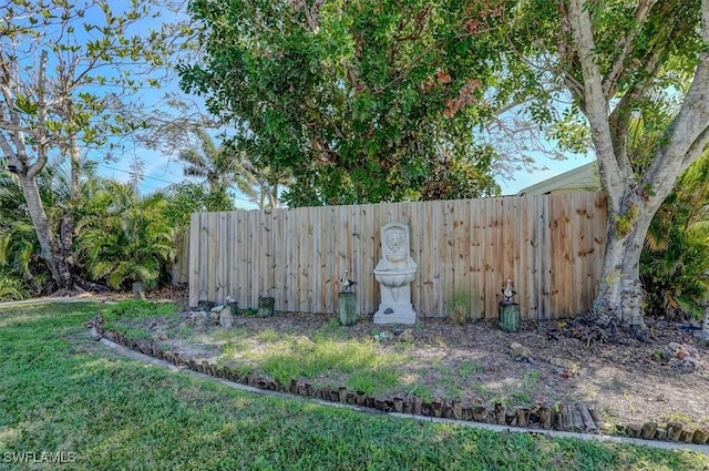 community sign featuring fence