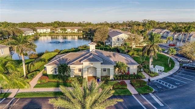 bird's eye view with a water view