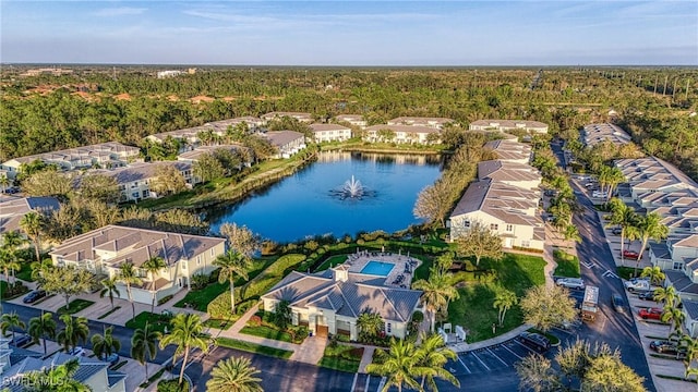 bird's eye view with a water view and a residential view