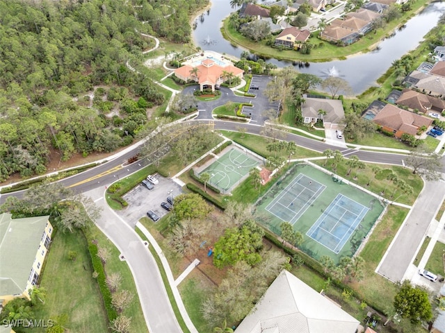 aerial view with a water view and a residential view