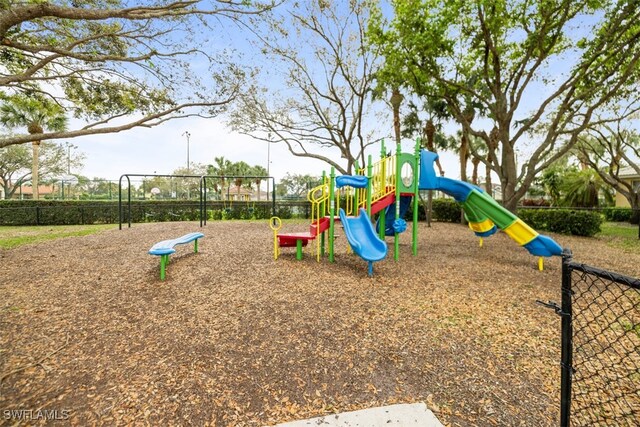 community play area featuring fence