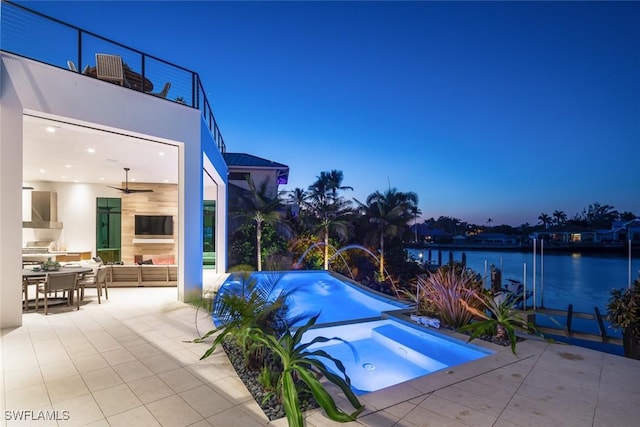 view of pool featuring an outdoor living space, an in ground hot tub, outdoor dining area, ceiling fan, and a patio area