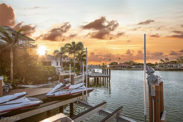 dock area featuring a water view and boat lift