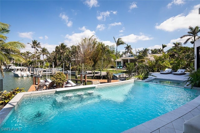 pool featuring boat lift, a water view, and a boat dock