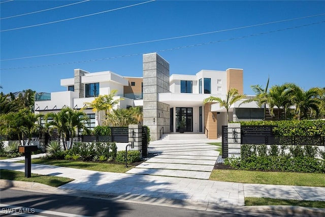 contemporary home featuring stucco siding