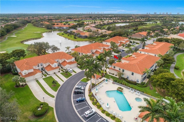 22810 Sago Pointe Dr Unit 2403, Estero, FL 34135 - aerial overview of property's location featuring a nearby body of water, nearby suburban area, a pool, and a golf course