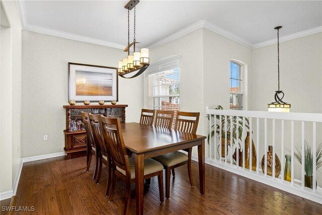 22810 Sago Pointe Dr Unit 2403, Estero, FL 34135 - dining space featuring wood finished floors, baseboards, a chandelier, and ornamental molding