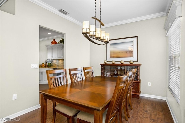 22810 Sago Pointe Dr Unit 2403, Estero, FL 34135 - dining area featuring ornamental molding, a chandelier, dark wood-type flooring, and baseboards