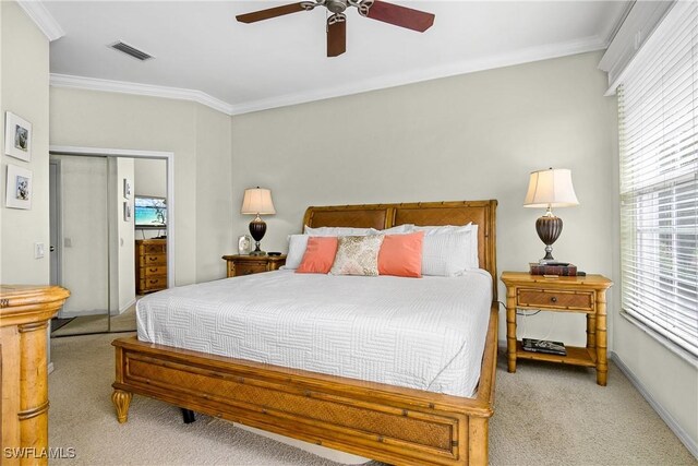 22810 Sago Pointe Dr Unit 2403, Estero, FL 34135 - bedroom with carpet flooring, crown molding, a closet, and ceiling fan