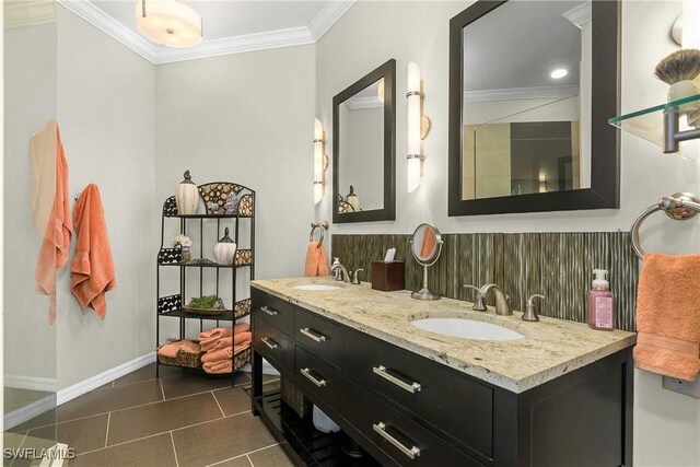 22810 Sago Pointe Dr Unit 2403, Estero, FL 34135 - full bath with crown molding, double vanity, tile patterned flooring, and baseboards