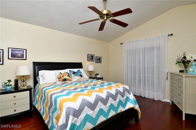 bedroom featuring a ceiling fan, vaulted ceiling, and dark wood-style flooring