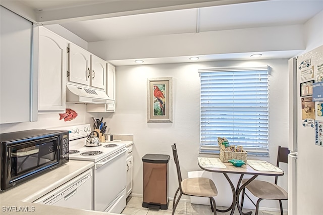 kitchen with under cabinet range hood, white appliances, baseboards, white cabinets, and light countertops