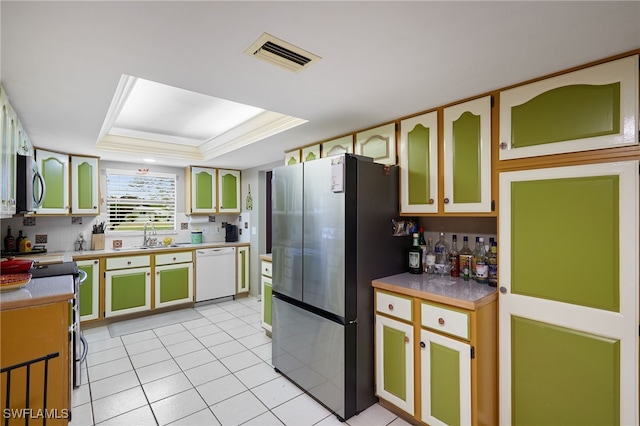 kitchen with light tile patterned floors, a raised ceiling, visible vents, appliances with stainless steel finishes, and a sink