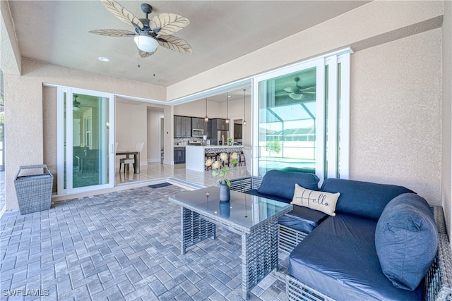 interior space featuring ceiling fan