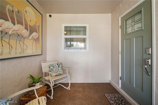 property entrance featuring covered porch