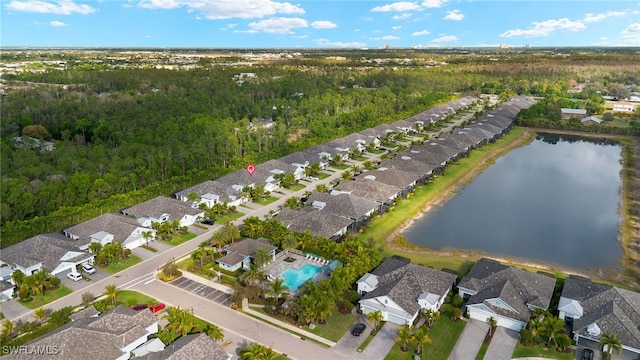 aerial view featuring a water view and a residential view