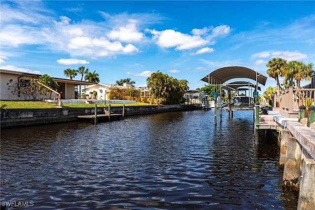 view of dock featuring a water view and boat lift