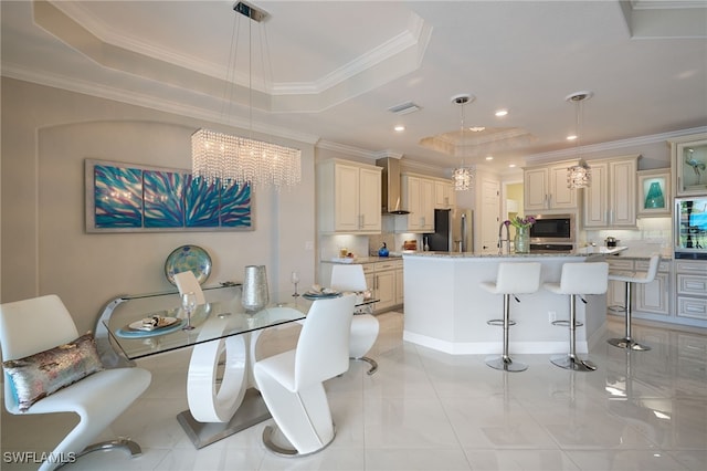 28074 Edenderry Ct, Bonita Springs, FL 34135 - dining room with a raised ceiling, a chandelier, ornamental molding, and recessed lighting