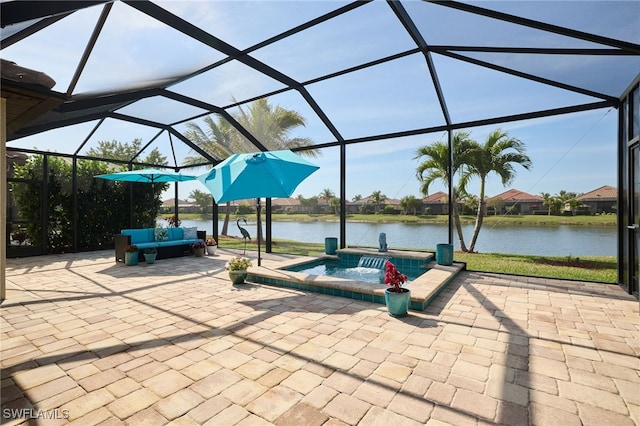 28074 Edenderry Ct, Bonita Springs, FL 34135 - view of patio / terrace with a jacuzzi, a water view, and a lanai